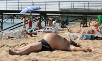 87_Fat_Guy_In_A_Little_Beach.jpg